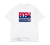 The BOSK Team BOSK Tee is a white heavyweight cotton shirt with bold red and blue "BOSK" lettering, "CALIFORNIA" text, and a star emblem on the chest. Available in men's sizing.